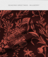 Close-up of the Season’s Greetings mulberry fabric tile, showcasing botanical illustrations printed on plush velvet.