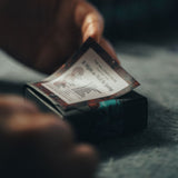 A homepage product image with a close up of a Hallowed House soap label