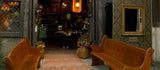 Mobile view of The Hallowed House at PA Renaissance Faire 2023, highlighting velvet textures and handcrafted object arrangements.