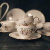 Vintage teacup with scenic design of the desert with a camel and a palace