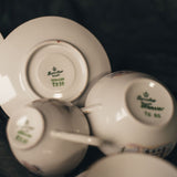 Close-up of teacups with 'Bareuther Steinbach Germany' branding and edition numbers