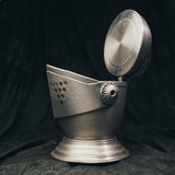 Open view of the knight’s helmet ice bucket with lid lifted to reveal the ice compartment inside.