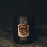 Faire Fortune candle with rare spices and woods for a sense of worldly opulence.