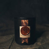 Mobile view of the Elixir of Life candle styled on a vintage tray with velvet accents, shown in warm lighting to highlight its soothing, mystic aesthetic.