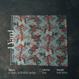 A Velvet Fabric swatch with floral pattern on teal background.  The image also contains material, colorway, and pattern information.