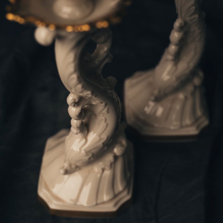 Close up photo of decorative Lenox Aquarius Ivory candle holders with an intricate design 