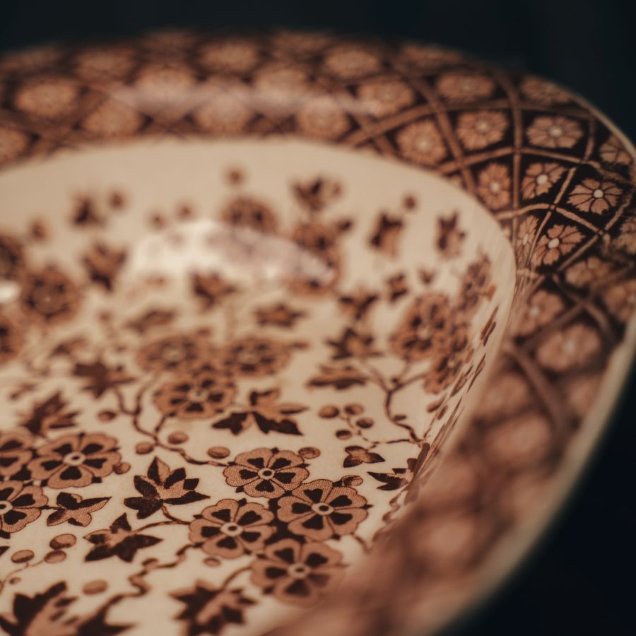 Close-up of a Ridgway Hawthornden Serving Bowl with a intricate floral design