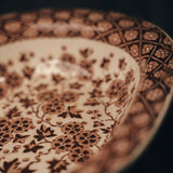 Close-up of a Ridgway Hawthornden Serving Bowl with a intricate floral design