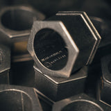 Close up shot of one of the Pewter Napkin Rings with copyright engraving on the inside