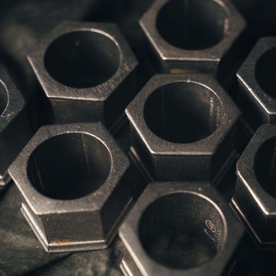 Close up shot of the set of 8 Pewter Napkin Rings with copyright engraving on the inside