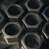 Close up shot of the set of 8 Pewter Napkin Rings with copyright engraving on the inside