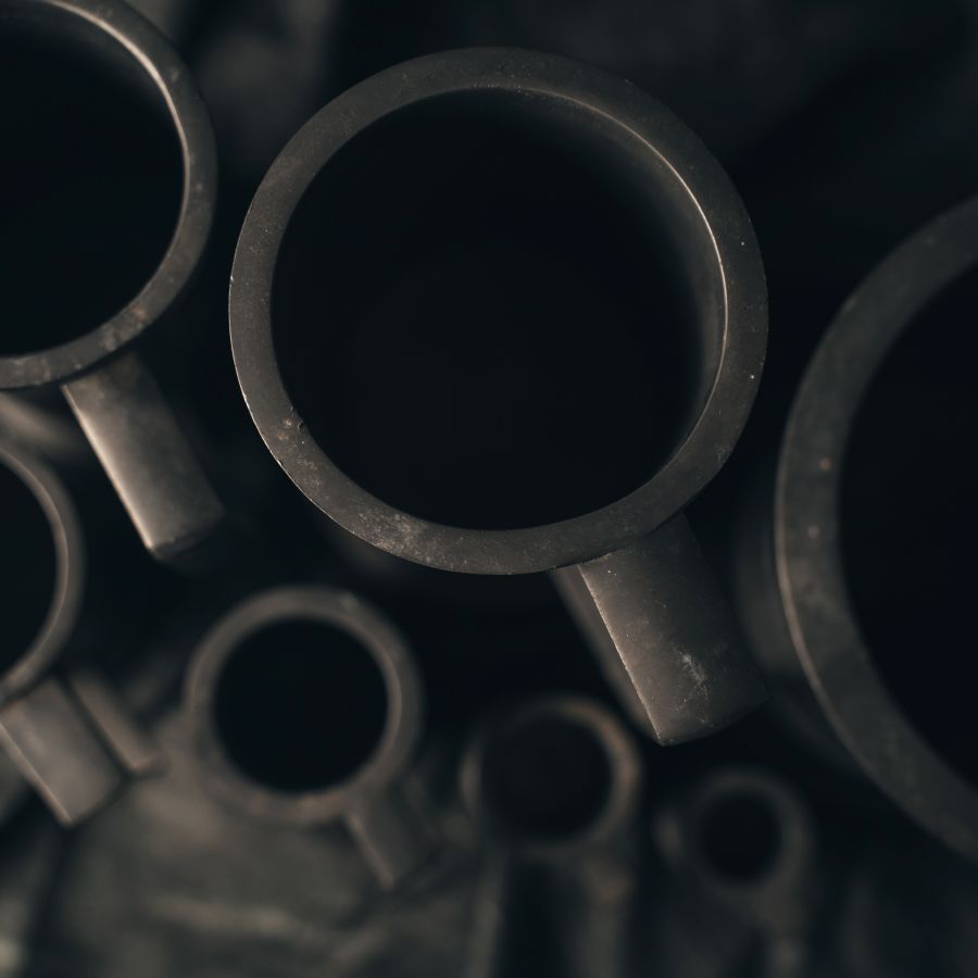 Close-up photo of antique Pewter Measuring Cups