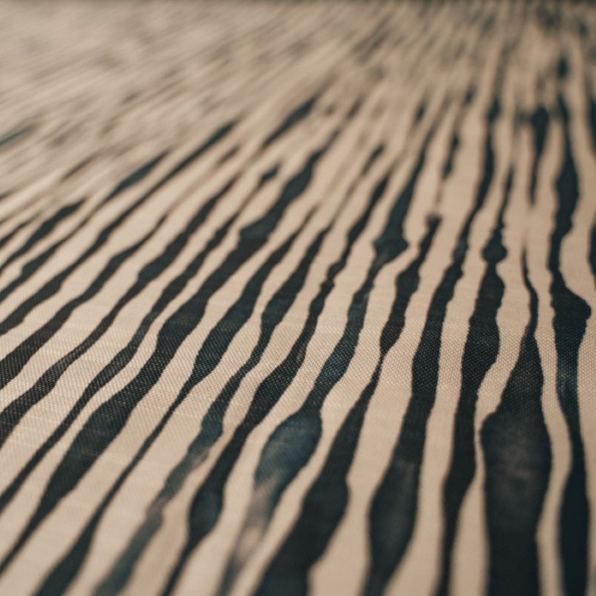 Close-up of the black and white Night's Tale Ink Veil Cotton Linen fabric.